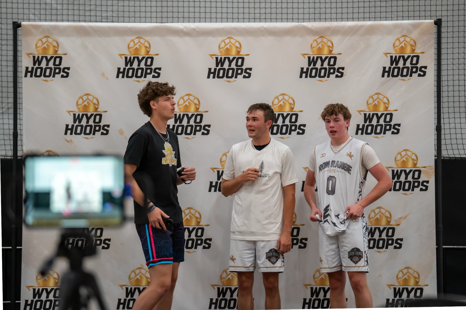A player interview is filmed in front of the WyoHoops media backdrop