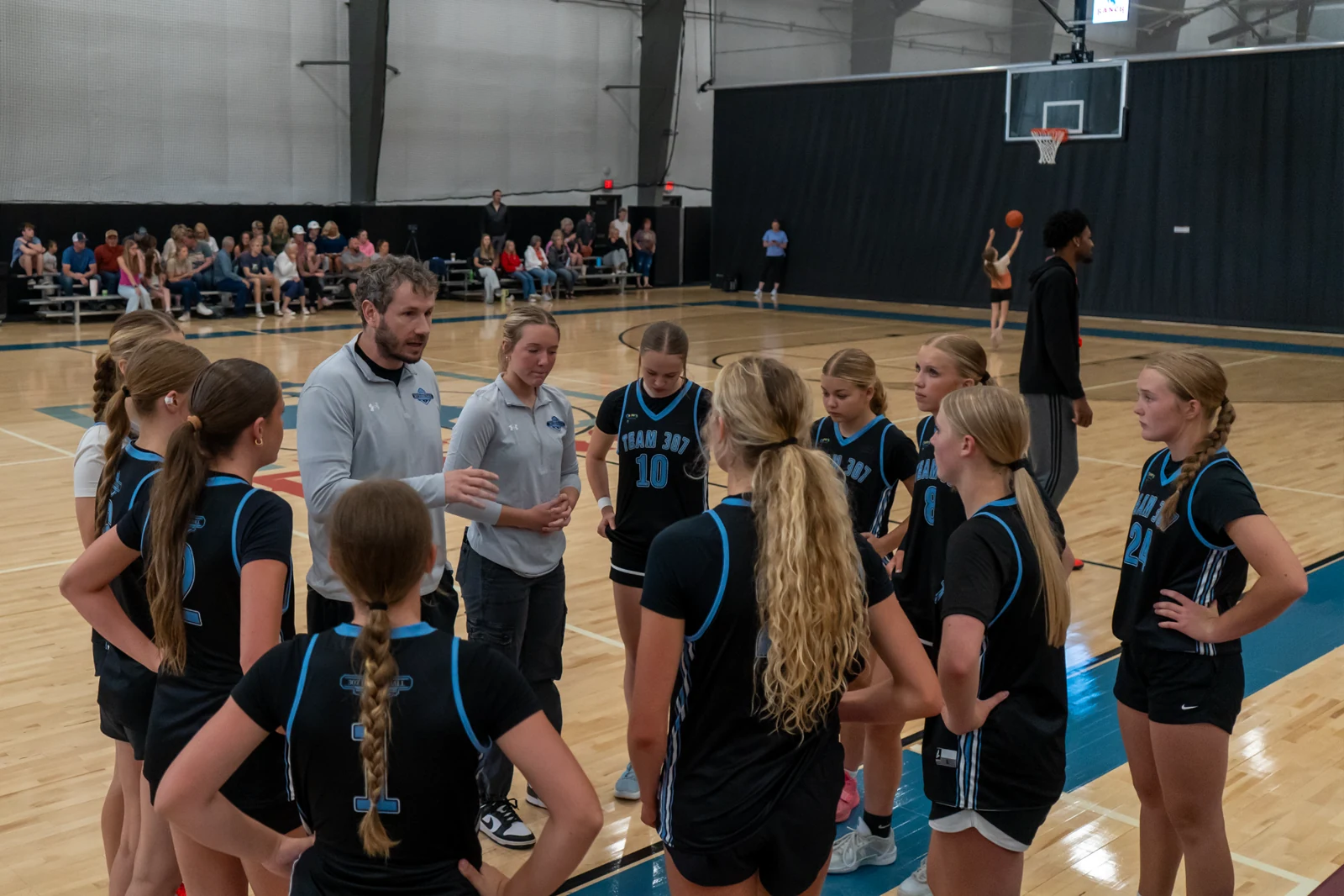 Players and coaches gather at a Wyoming basketball event
