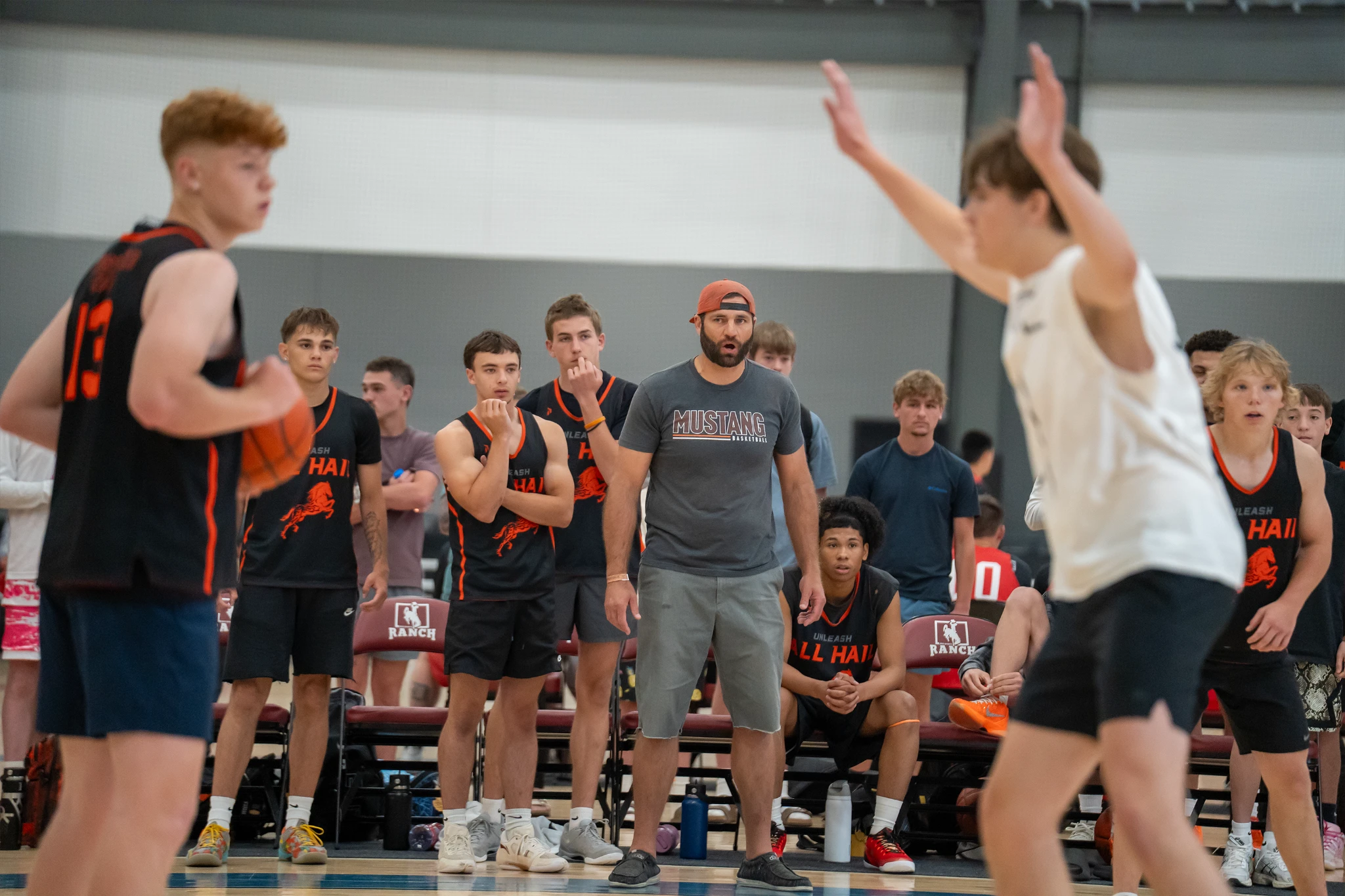 Tournament basketball players compete at a WyoHoops event