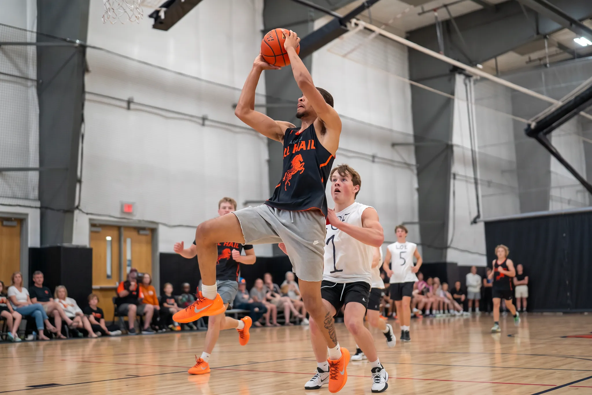 Tournament basketball action in a Wyoming gym